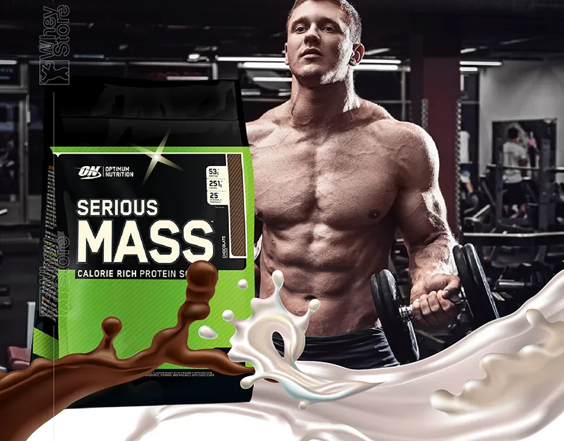 Optimum Nutrition Serious Mass bag with a chocolate and milk splash effect, featuring a muscular bodybuilder in the background.